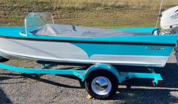 Retro 1957 Starcraft Ski Champ side